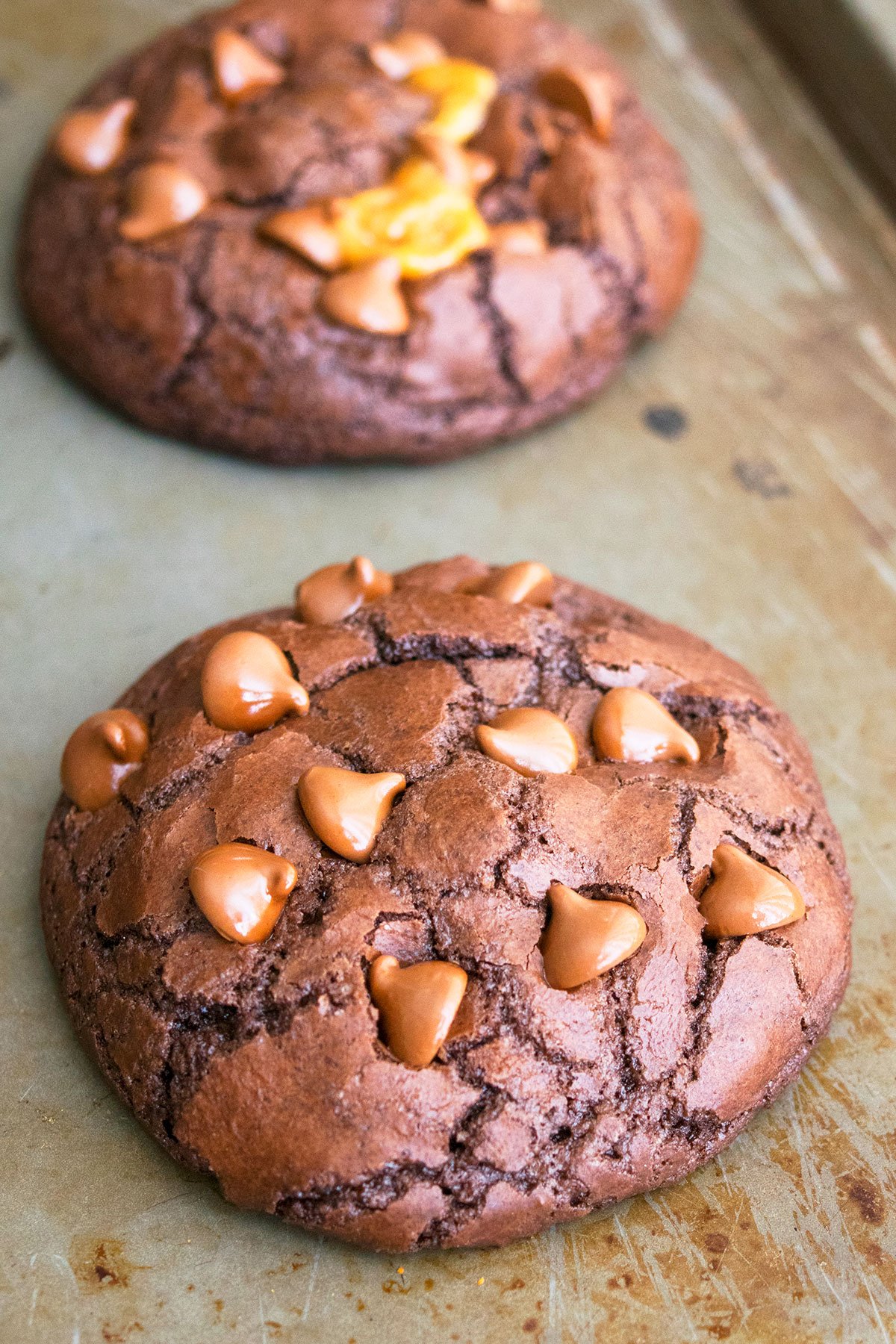 Stuffed Chocolate Caramel Cookies With Chocolate Chips on Baking Tray. 