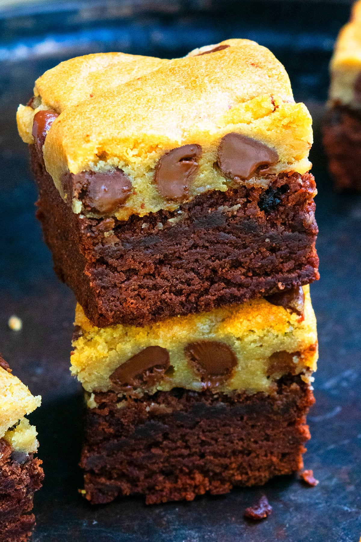 Stack of Homemade Loaded Bars on Dark Metal Tray. 