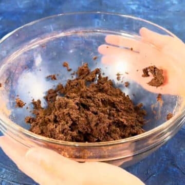 Chocolate cookie dough in glass bowl. 