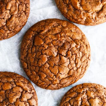 Easy Chocolate Brownie Cookies With Brownie Mix Box on Parchment Paper- Overhead Shot.