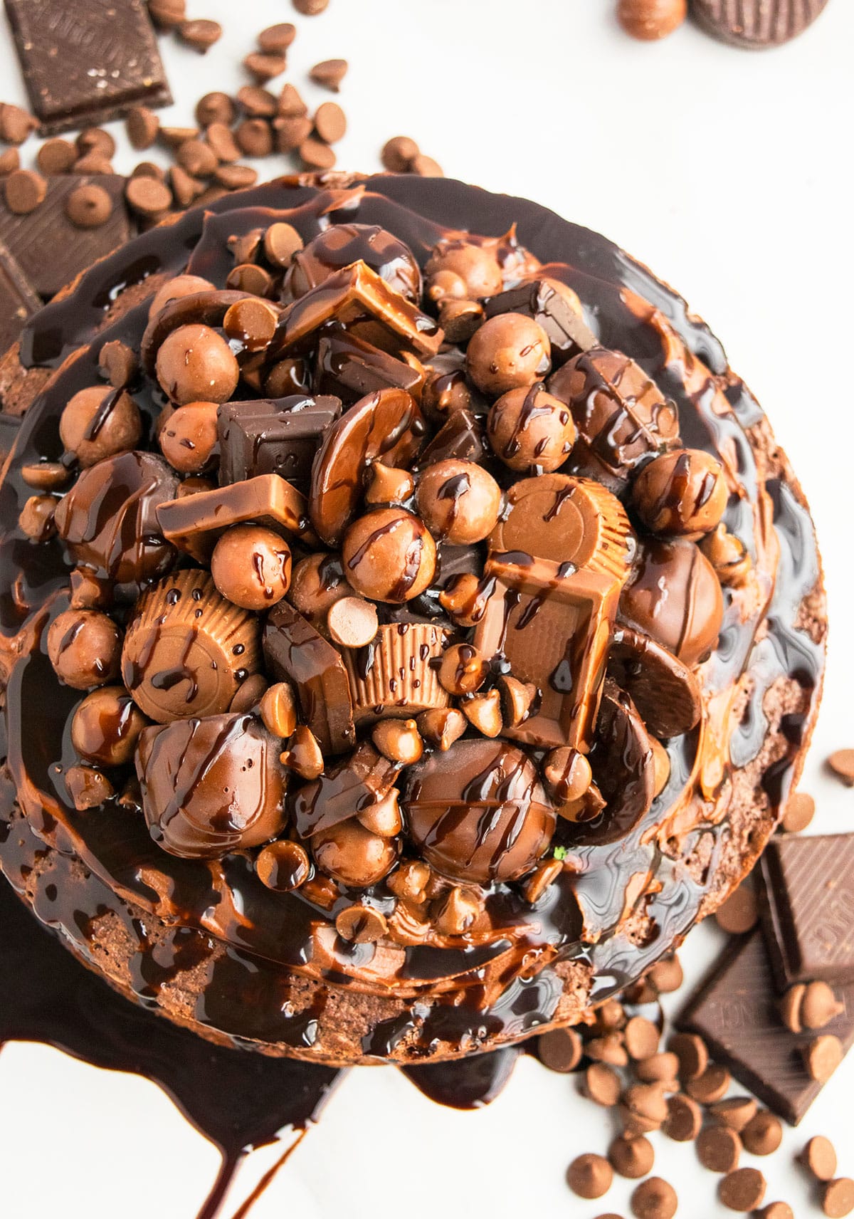 Overhead Shot of Chocolate Decorations and Ganache Drizzle on Top of Cake. 