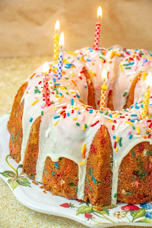 Birthday cake with candles and funfetti.