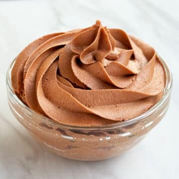 Easy Nutella Frosting (Buttercream Icing) in Glass Bowl.