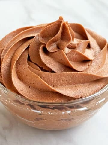 Easy Nutella Frosting (Buttercream Icing) in Glass Bowl.