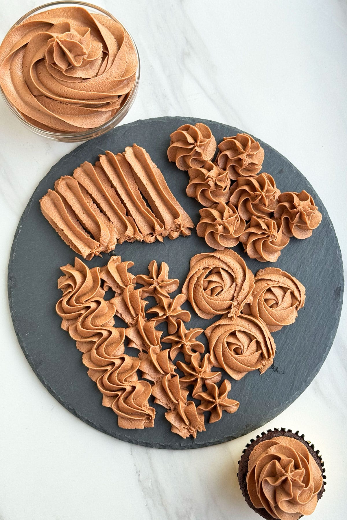 Nutella Buttercream Icing Piped on Black Dish. 