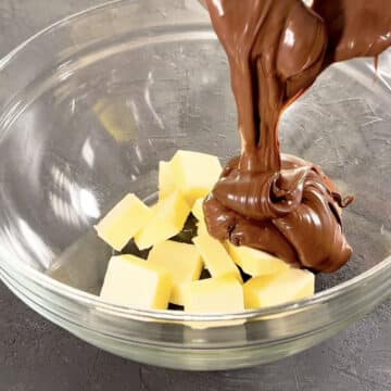 Nutella and butter in glass bowl. 