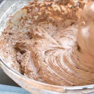 Chocolate cupcake batter in glass bowl. 