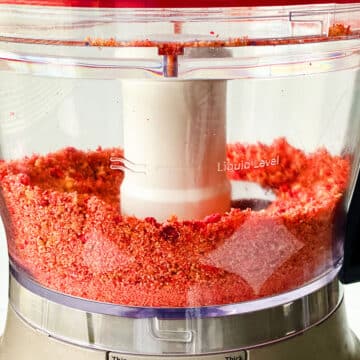 Freeze dried strawberries, butter and Nilla wafers pulsed into small crumbs in food processor. 