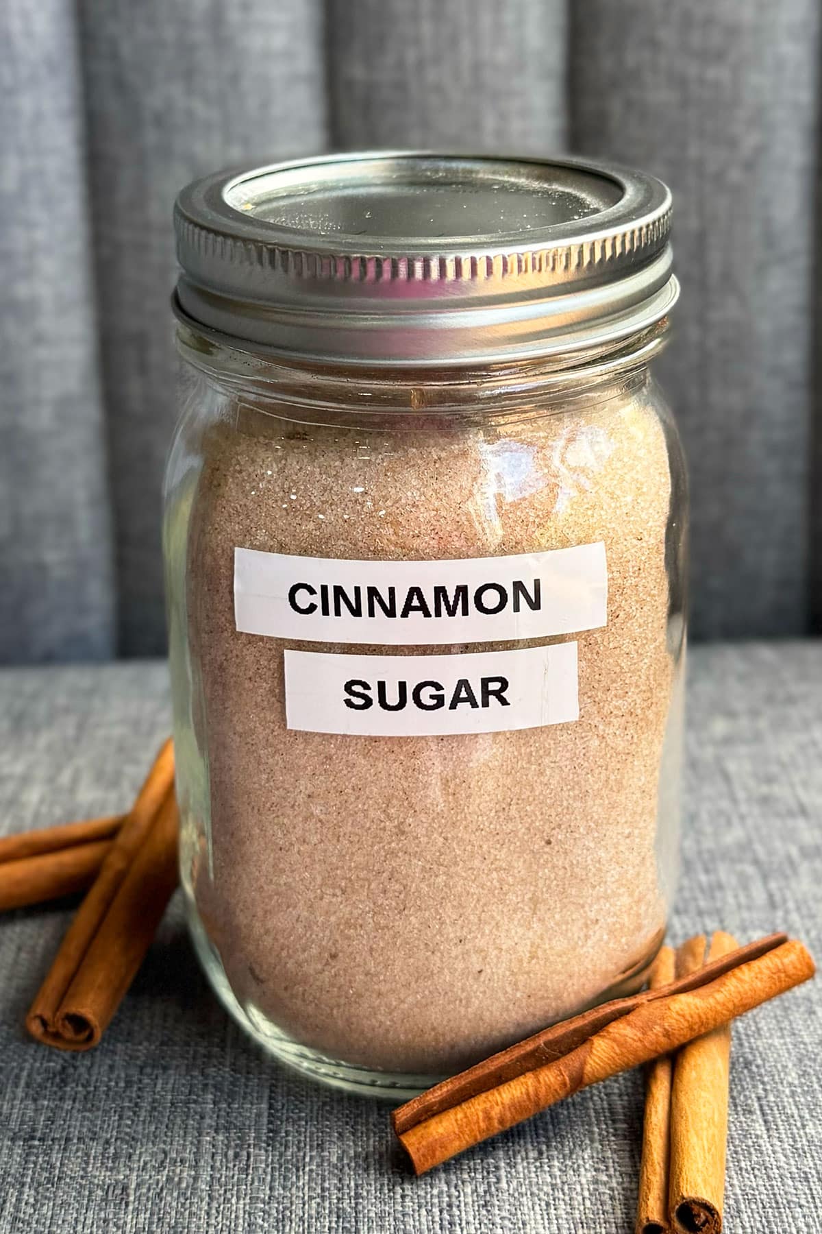 Homemade spiced sugar mixture in glass mason jar. 