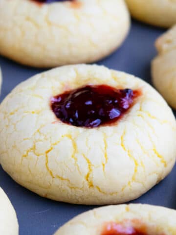Easy Lemon Raspberry Cookies (Thumbprint) Made With Cake Mix on Baking Tray- Closeup Shot.